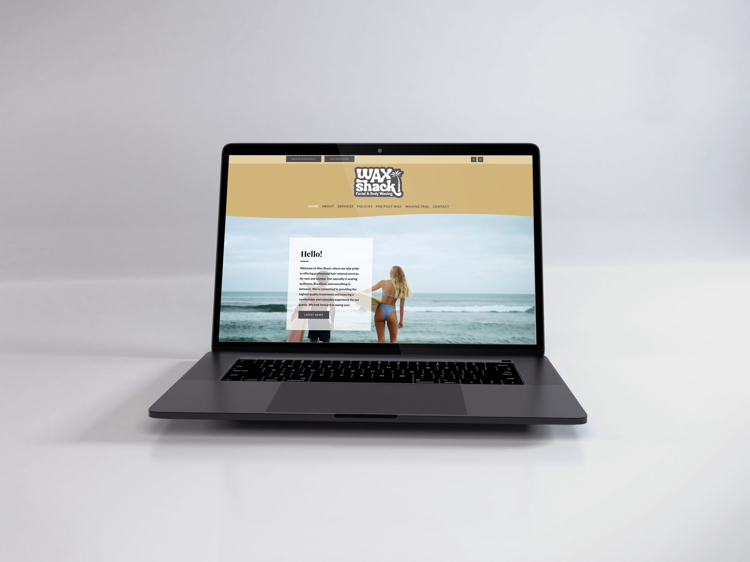 Laptop showing the Wax Shack website