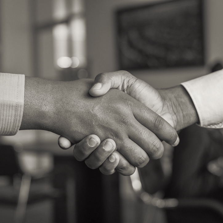 two hands shaking two hands shaking